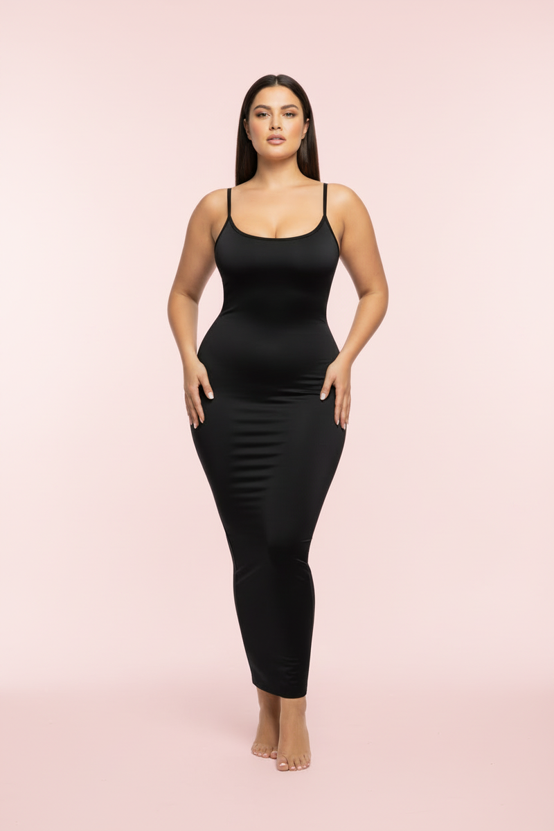 Confident woman wearing sleek black spaghetti strap maxi shapewear dress - Shape Wear For Her Shapewear Dresses Collection